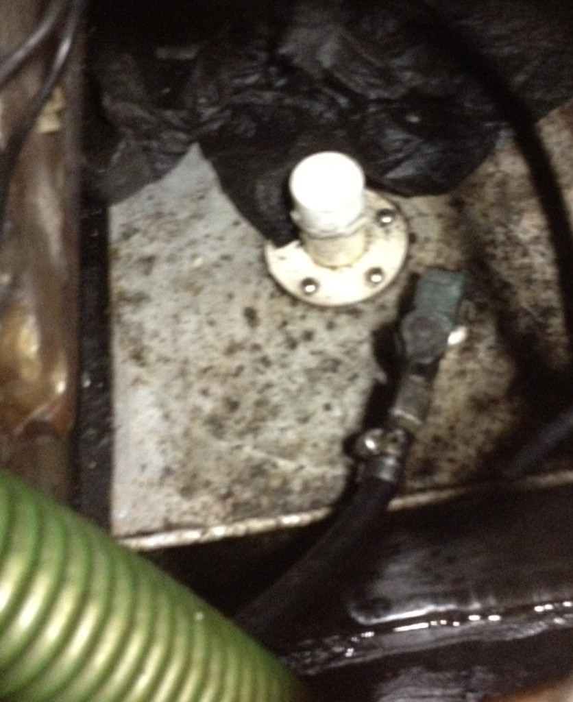 Aluminum tank has been leaking diesel into the sump for some time.